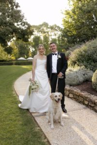 Bride and Husband and Dog on their wedding day