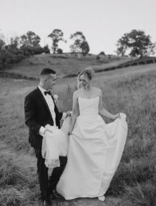 Bride wearing a modern KYHA wedding dress