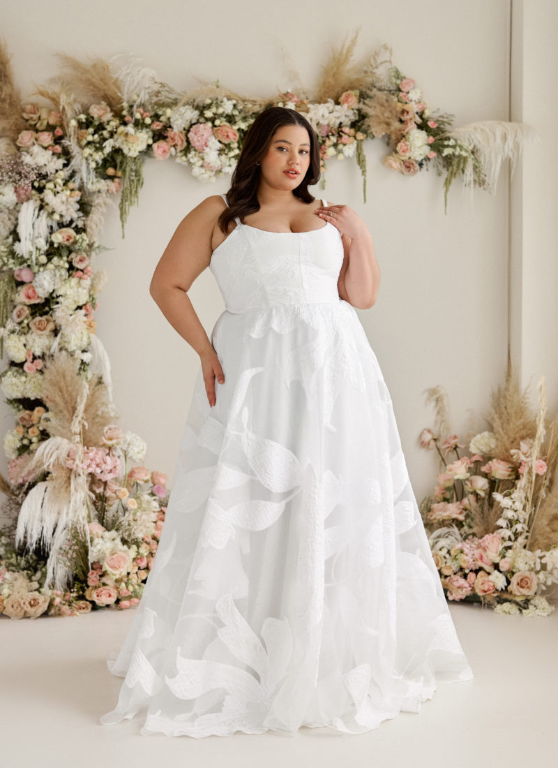 Truvelle Iris wedding gown on a plus size model