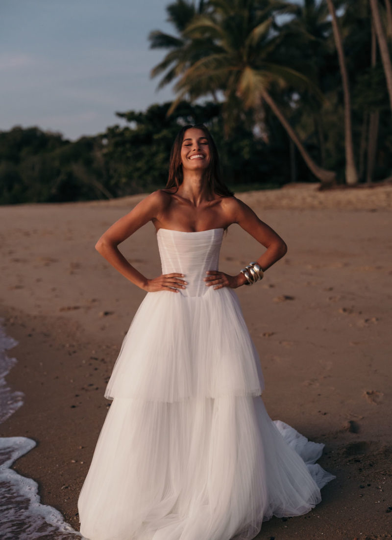 Model wearing a modern tulle wedding dress by Alena Leena